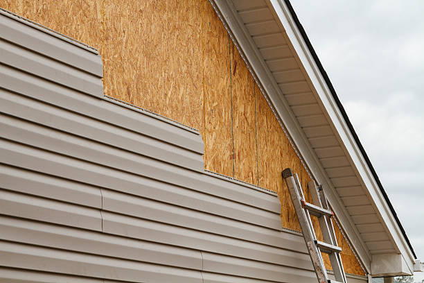 Professional Siding Contractor technician working in Darlington, MD